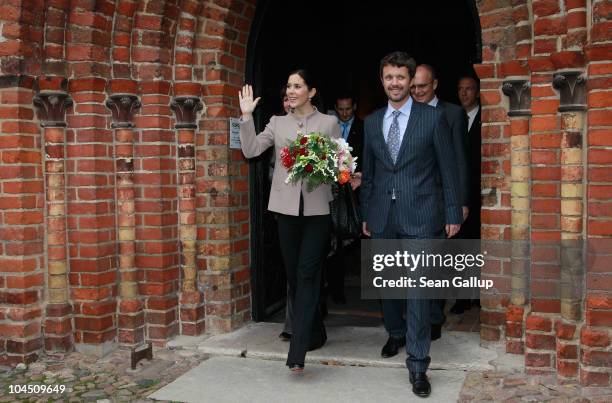 Danish Crown Prince Frederik and Danish Crown Princess Mary, who is pregnant with twins, exit the Dom church after visiting it on September 28, 2010...