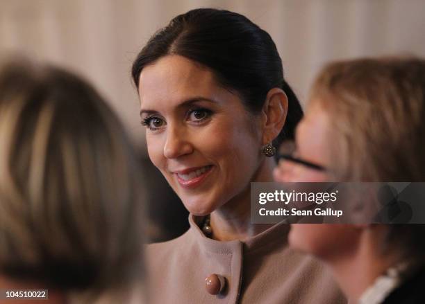 Danish Crown Princess Mary, who is pregnant with twins, tours Schloss Guestrow palace with her husband Danish Crown Prince Frederik on September 28,...