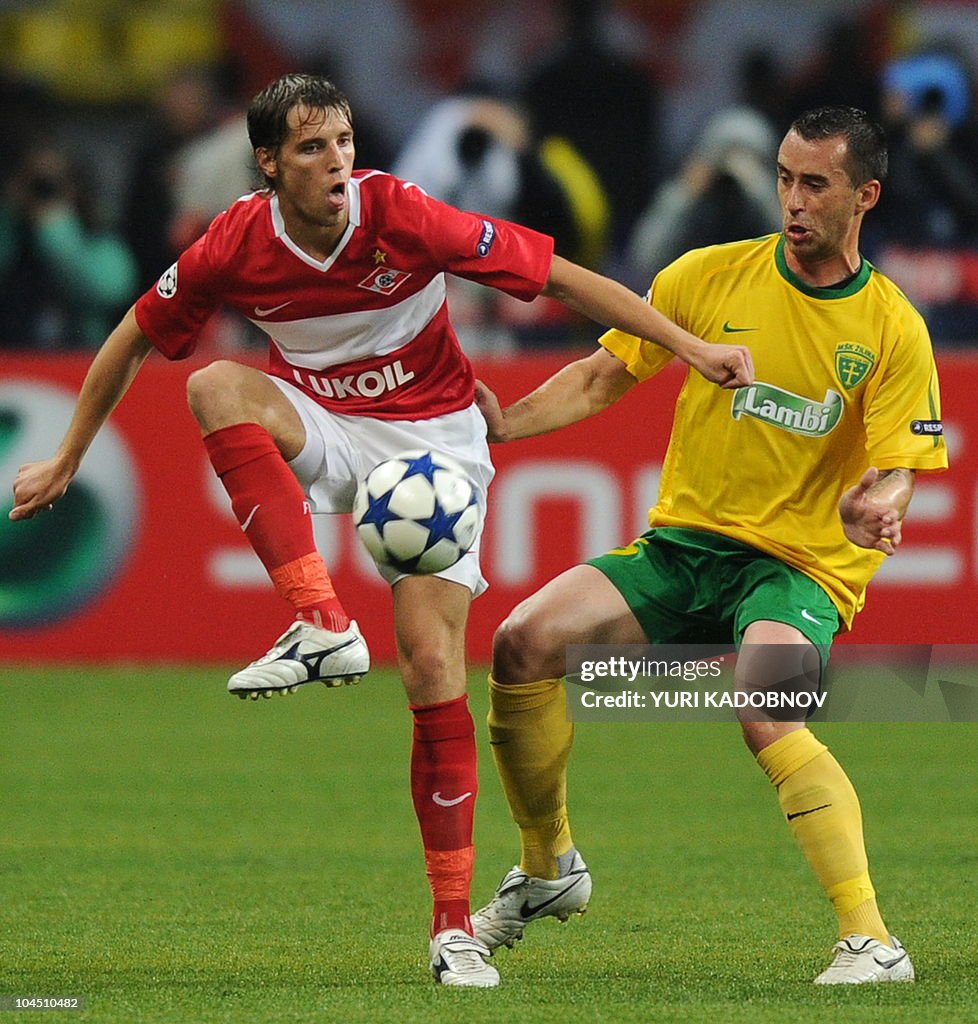 Dmitri Kombarov (L) of Spartak Moscow vi