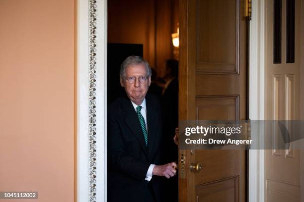 Senate Majority Leader Mitch McConnell leaves a closed-door lunch meeting of GOP Senators at the U.S. Capitol, October 3, 2018 in Washington, DC. An...