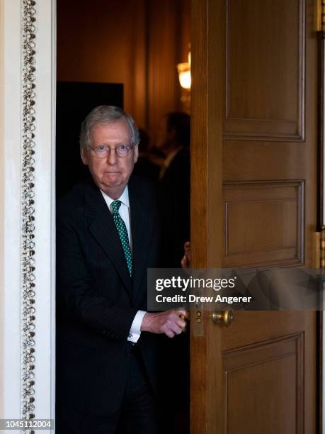 Senate Majority Leader Mitch McConnell leaves a closed-door lunch meeting of GOP Senators at the U.S. Capitol, October 3, 2018 in Washington, DC. An...