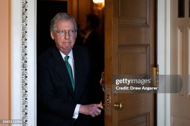 Senate Majority Leader Mitch McConnell leaves a closed-door lunch meeting of GOP Senators at the U.S. Capitol, October 3, 2018 in Washington, DC. An...