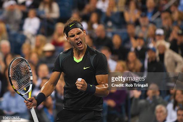 Rafael Nadal reacts after winning the third set against Novak Djokovic in the men's final on day fifteen of the 2010 U.S. Open at the USTA Billie...