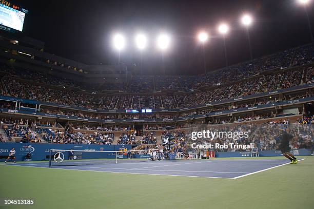 Rafael Nadal serves to Novak Djokovic in the men's final on day fifteen of the 2010 U.S. Open at the USTA Billie Jean King National Tennis Center on...