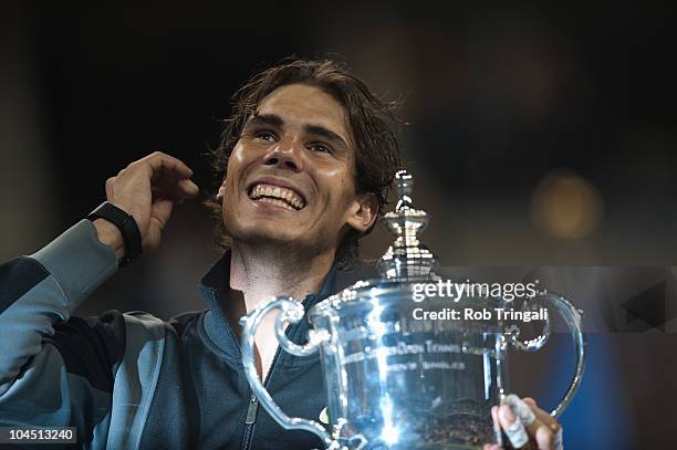 Rafael Nadal looks on with the US Open Trophy after defeating Novak Djokovic in the men's final on day fifteen of the 2010 U.S. Open at the USTA...