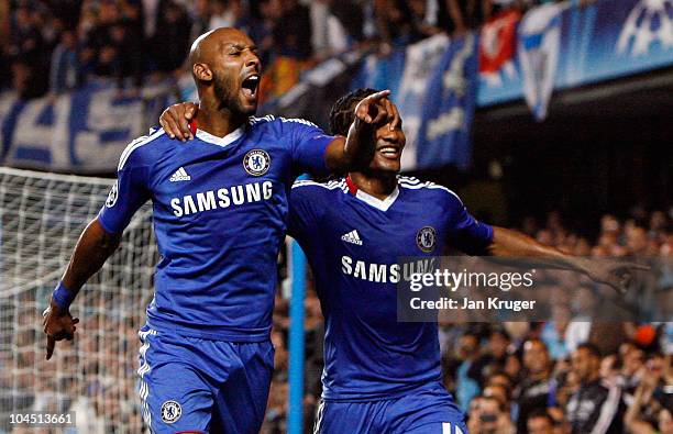 Nicolas Anelka of Chelsea celebrates his goal from the penalty spot with team-mate Florent Malouda during the UEFA Champions League Group F match...