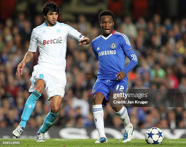 John Obi Mikel of Chelsea controlls the ball from Lucho Gonzalez of Marseille during the UEFA Champions League Group F match between Chelsea and...