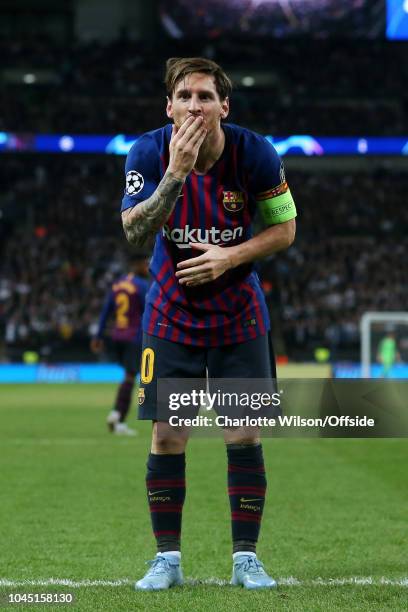 Lionel Messi of Barcelona celebrates after scoring their 3rd goal during the Group B match of the UEFA Champions League between Tottenham Hotspur and...