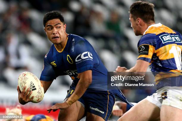 Josh Ioane of Otago looks to fend off Kaleb Trask of Bay of Plenty during the round eight Mitre 10 Cup match between Otago and Bay of Plenty at...