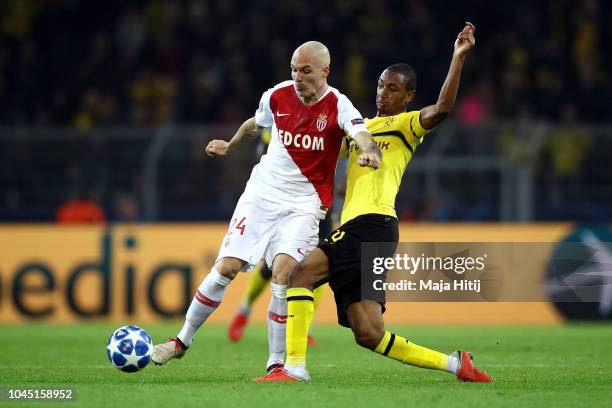 Andrea Raggi of Monaco is tackled by Abdou Diallo of Borussia Dortmund during the Group A match of the UEFA Champions League between Borussia...