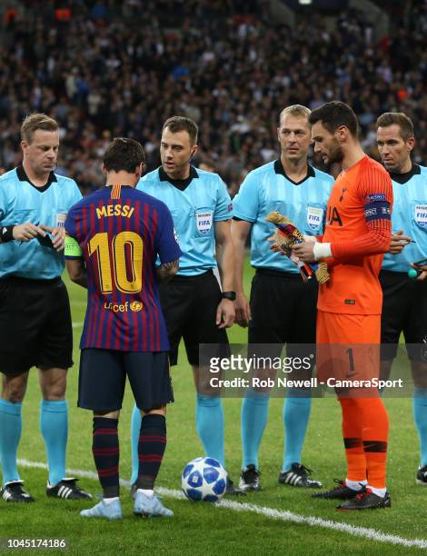 The captains; Tottenham Hotspur's Hugo Lloris and Barcelona's Lionel Messiduring the Group B match of the UEFA Champions League between Tottenham...