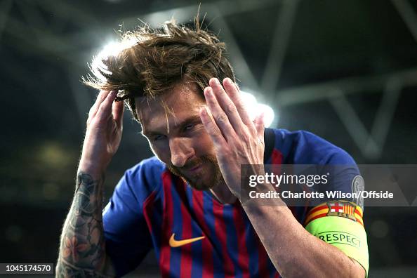 Lionel Messi of Barcelona celebrates scoring their 3rd goal during