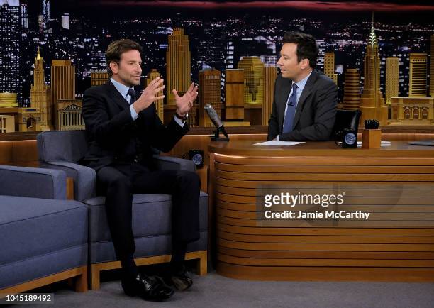 Bradley Cooper and host Jimmy Fallon during a segment on "The Tonight Show Starring Jimmy Fallon" at Rockefeller Center on October 3, 2018 in New...
