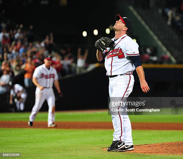 Billy Wagner of the Atlanta Braves reacts after recording the final out against the Florida Marlins at Turner Field on September 28, 2010 in Atlanta,...