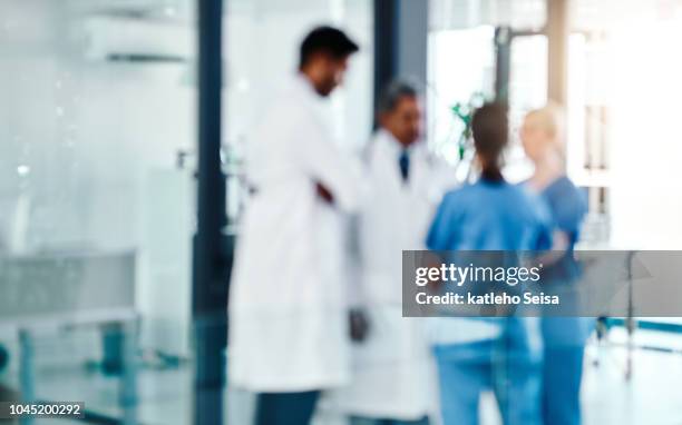 the experts are always on the job - hospital teamwork stock pictures, royalty-free photos & images