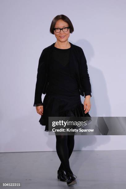 Moon Young Hee poses on the runway during the Moon Young Hee Ready to Wear Spring/Summer 2011 show during Paris Fashion Week at Espace Commines on...