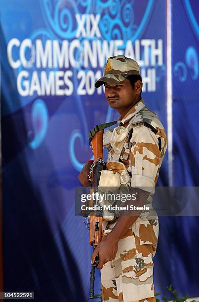 Soldier stands guard at the R.K Khanna tennis complex ahead of the Delhi 2010 Commonwealth Games on September 29, 2010 in Delhi, India.