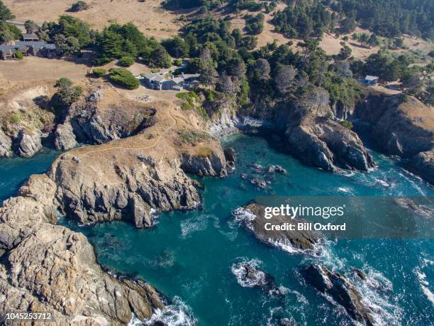 drone aerial view of house by pacific ocean in sonoma mendocino california. sea ranch - mendocino county stock pictures, royalty-free photos & images