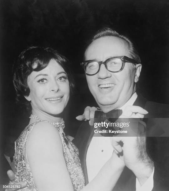 Austrian-born American actress Hedy Lamarr dancing with her sixth husband, Lewis J. Boies, at an after party for the premiere of Ronald Neame's 'The...