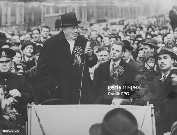 Winston Churchill campaigning in the By-elections at Blythe Road, London, circa 1949. With him is Conservative candidate A. Fell.