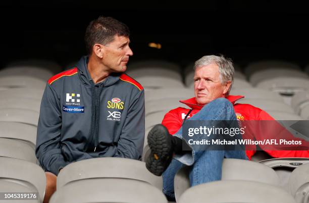 Ashley Prescott, Assistant Coach of the Suns and George Stone look on during the AFL Draft Combine at Marvel Stadium on October 4, 2018 in Melbourne,...