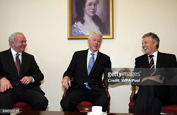 Former US President Bill Clinton with Northern Ireland First Minister Peter Robinson and Deputy First Minister Martin McGuinness meet at the...