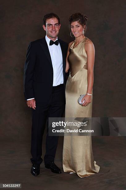 Edoardo Molinari of the European Ryder Cup team poses with his partner Anna Roscio prior to the 2010 Ryder Cup Dinner at the Celtic Manor Resort on...