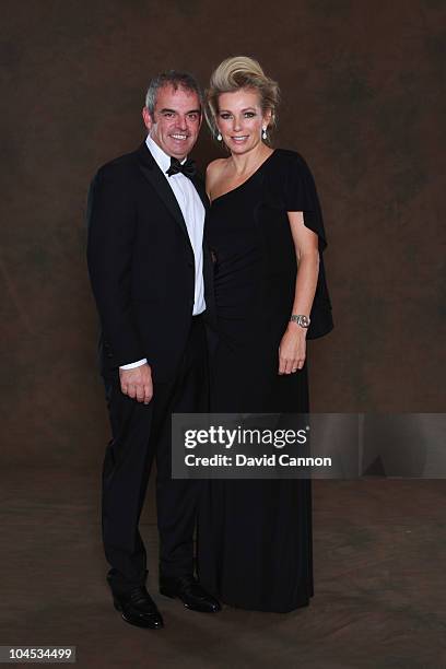 European Ryder Cup team vice-captain Paul McGinley poses with his wife Alison prior to the 2010 Ryder Cup Dinner at the Celtic Manor Resort on...