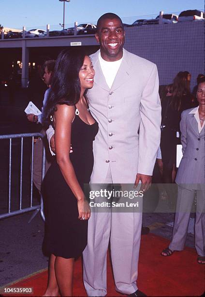 Magic Johnson & Wife Cookie during Hoodlum Premiere at Magic Johnson Theatre in Los Angeles, California, United States.