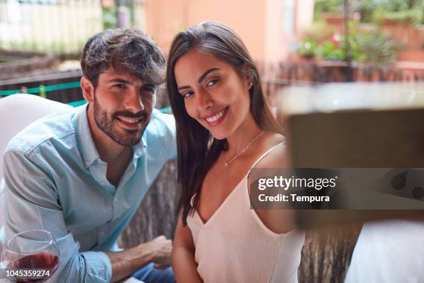 romantic dinner - young couple date night wine stock pictures, royalty-free photos & images