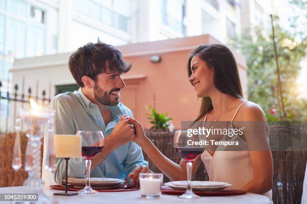 romantic dinner - young couple date night wine stock pictures, royalty-free photos & images