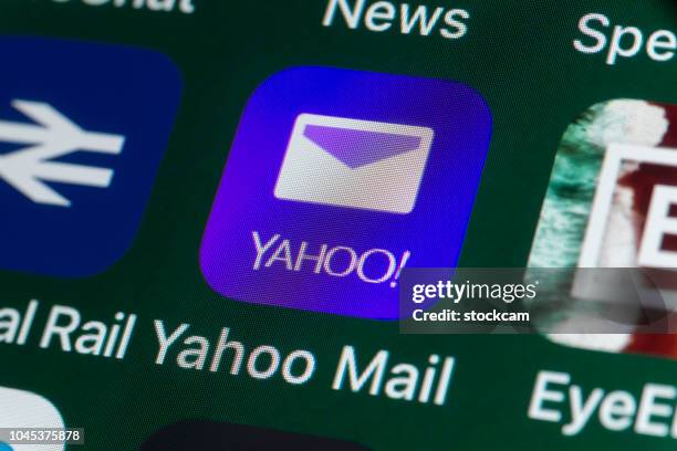 yahoo mail, national rail, eyeem and other apps on iphone screen - eyeem stock pictures, royalty-free photos & images