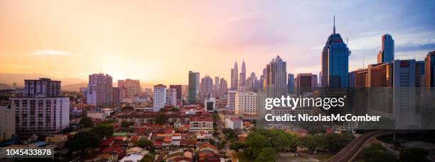 kuala lumpur aerial panoramic skyline at dawn - malaysia skyline stock pictures, royalty-free photos & images