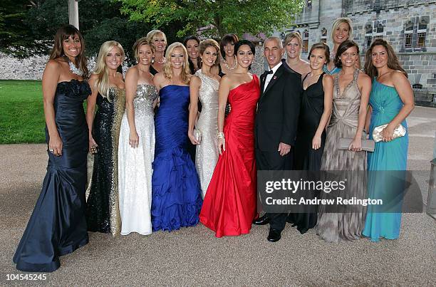 Team captain Corey Pavin and the wives and partners of the United States Ryder Cup team pose for a photograph during the 2010 Ryder Cup Dinner at...