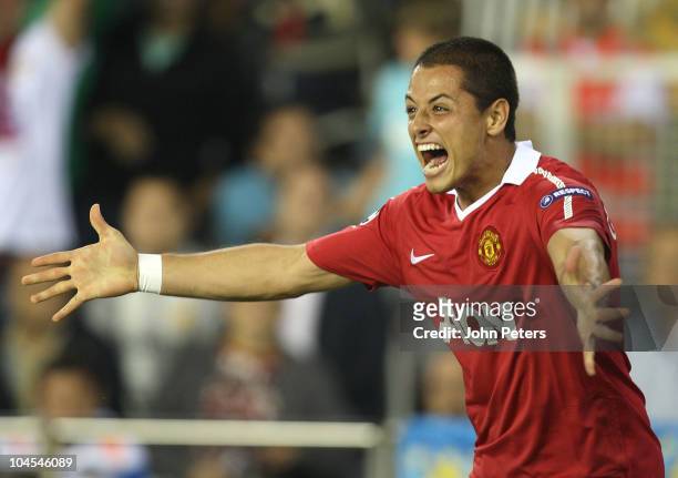 Javier "Chicharito" Hernandez of Manchester United celebrates scoring their first goal during the UEFA Champions League Group C match between...