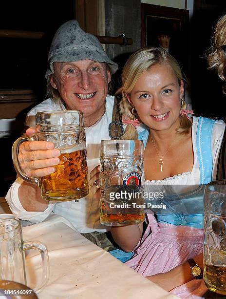 Otto Waalkes and Ruth attend the Kaefer Zelt at Hippodrom during the Oktoberfest 2010 at Theresienwiese on September 29, 2010 in Munich, Germany.