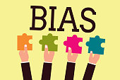 Writing note showing Bias. Business photo showcasing Prejudice in favor of and against one thing Considered to be Unfair