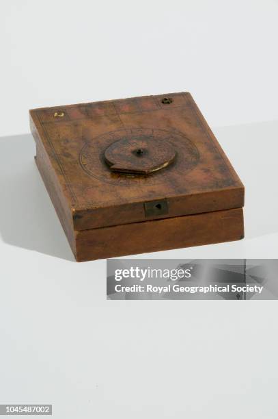 Box containing Chinese sundial, Chinese sundial of the Luremberg pattern, used as a compass by Chinese junk arriving at Hong Kong from Australia in...