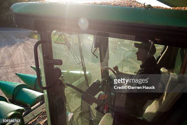 Rick Roden, drives a tractor at the Rob-N-Cin farm on September 29, 2010 in West Bend, Wisconsin. The farm has roughly 400 head of cattle and about...