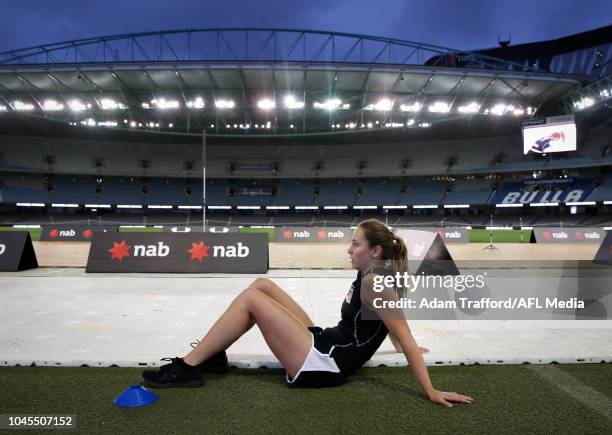 Natalie Grider catches her breath after the 2km time trial during the AFLW Draft Combine at Marvel Stadium on October 3, 2018 in Melbourne, Australia.