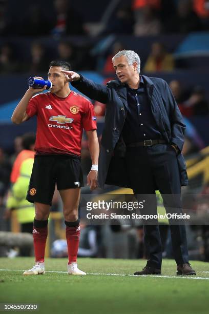 Man Utd manager Jose Mourinho talks to Alexis Sanchez of Man Utd during the Group H match of the UEFA Champions League between Manchester United and...