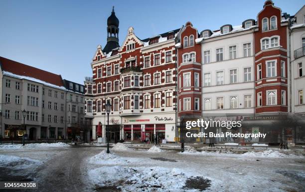 beautiful buildings in a square in koepenick, a district in the east of berlin, germany - köpenick straße stock-fotos und bilder