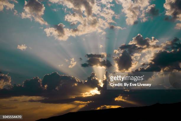 dawn rays over the torcal mountains - appear stock pictures, royalty-free photos & images