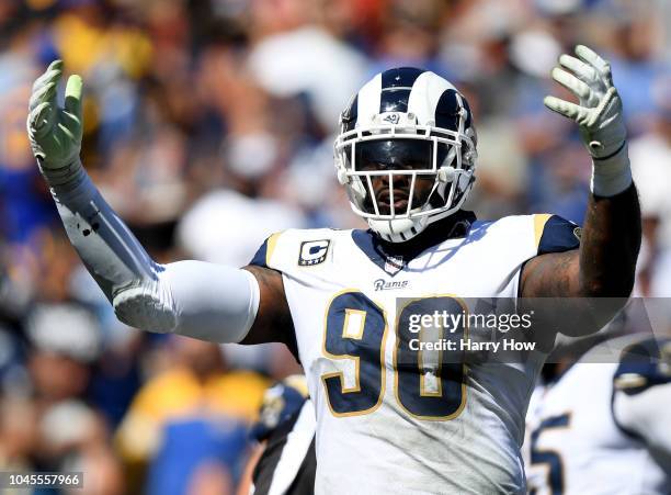 Michael Brockers of the Los Angeles Rams reacts to the crowd during the game against the Arizoa Cardinals at Los Angeles Memorial Coliseum on...