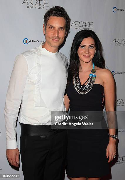 Cameron Silver and Rochelle Gores Fredston arrives at ARCADE Boutique's 'The Autumn Party' benefiting Children's Institute, Inc at The London West...