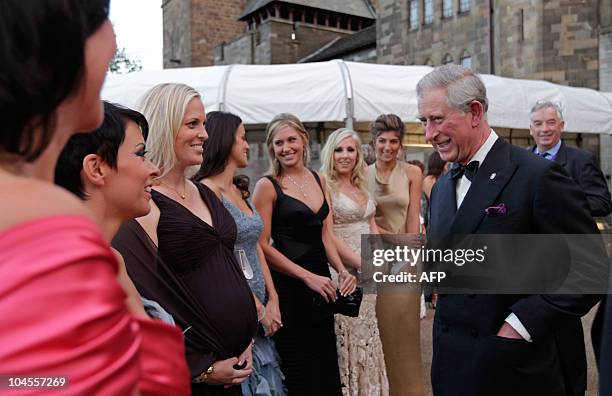 Britain's Prince Charles , meets the wives and girlfriends of the Europe Ryder Cup players, before the "Welcome to Wales 2010 Ryder Cup" dinner at...