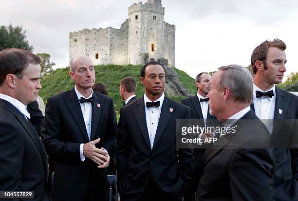 America Ryder Cup player, Tiger Woods , stands with team-mates before the "Welcome to Wales 2010 Ryder Cup" dinner at Cardiff Castle, in Wales, on...