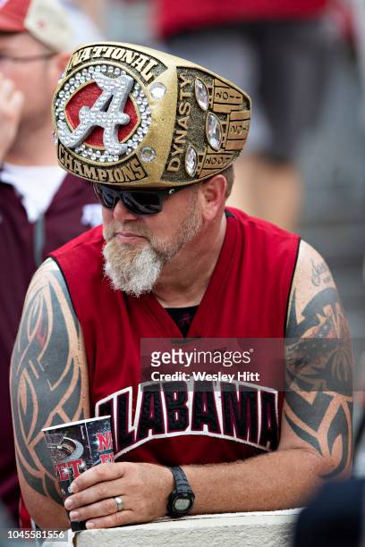 Fan of the Alabama Crimson Tide dressed up before a game against the Texas A&M Aggies at Bryant-Denny Stadium on September 22, 2018 in Tuscaloosa,...