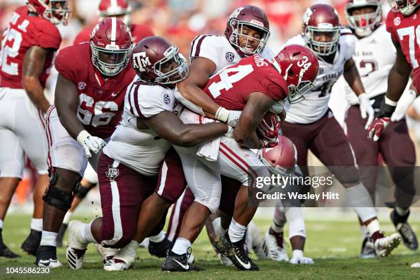 Damien Harris of the Alabama Crimson Tide runs the ball during a game against the Texas A&M Aggies at Bryant-Denny Stadium on September 22, 2018 in...