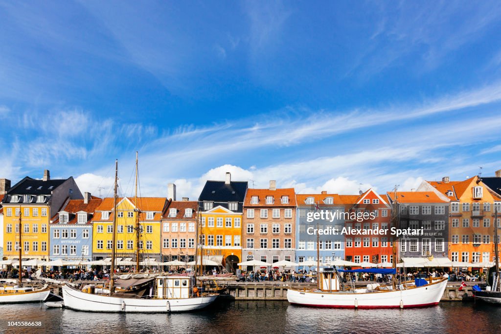 Colorful vibrant houses at Nyhavn harbor in Copenhagen, Denmark